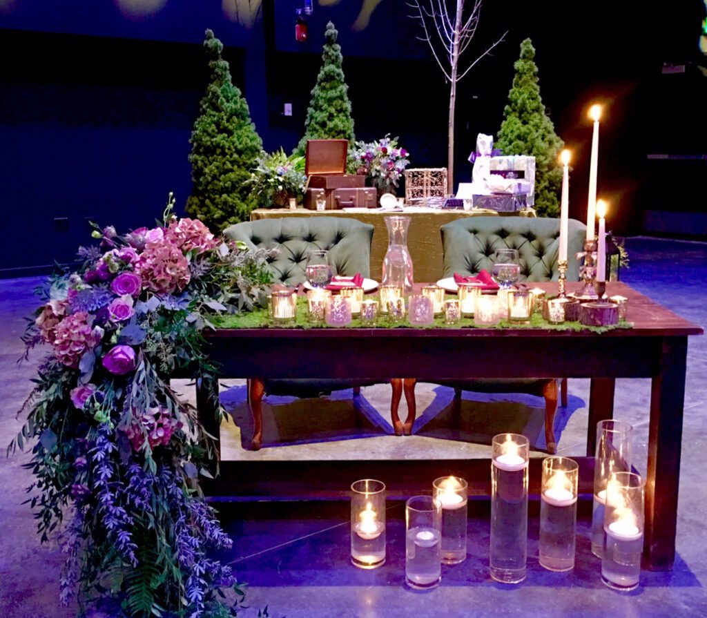 Luxury seats and tables with candles for groom and bride