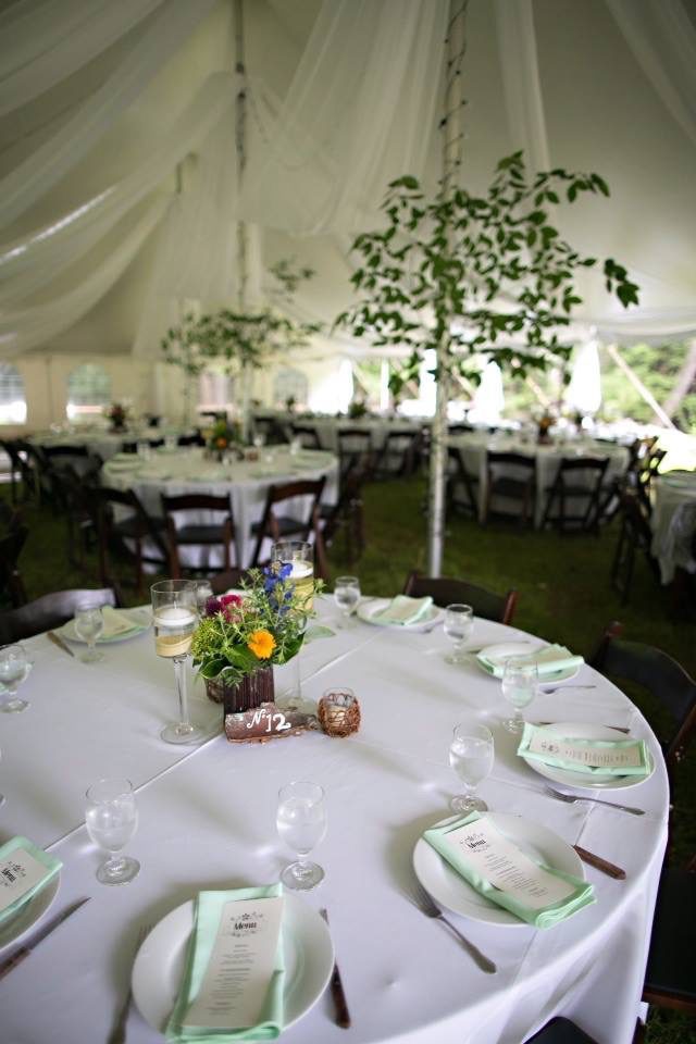 Wedding venue with a table in a white cloth with plates