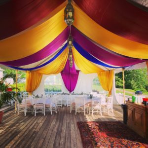 Rainbow top design in an open space wedding venue
